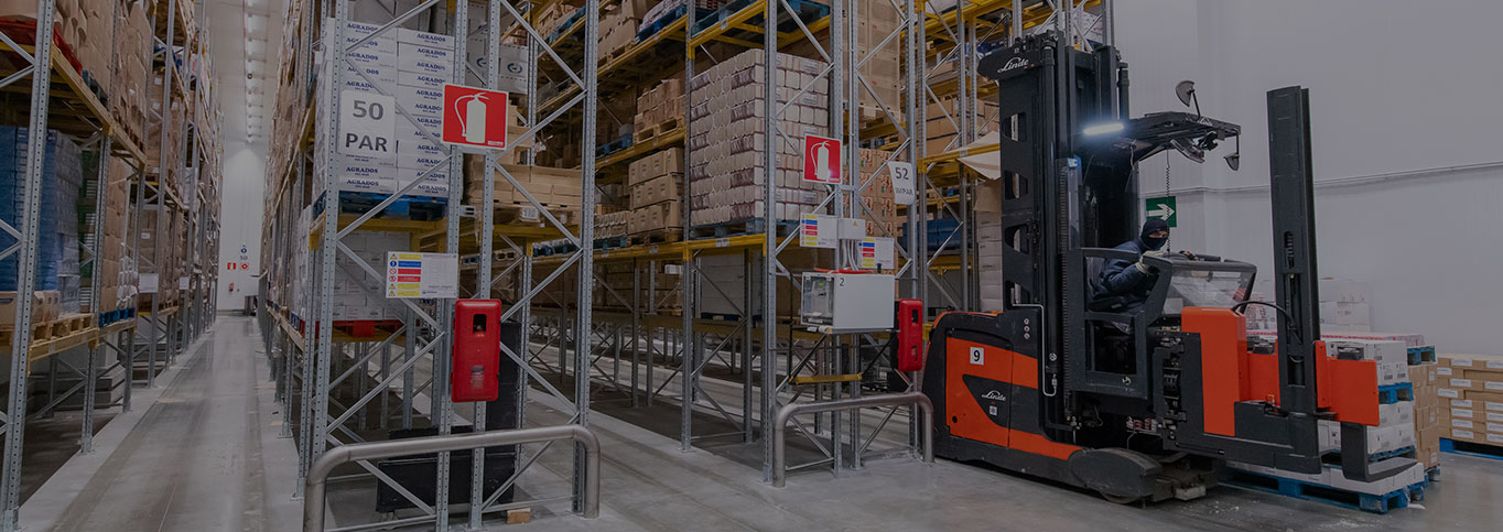 Man on fork lift loading product